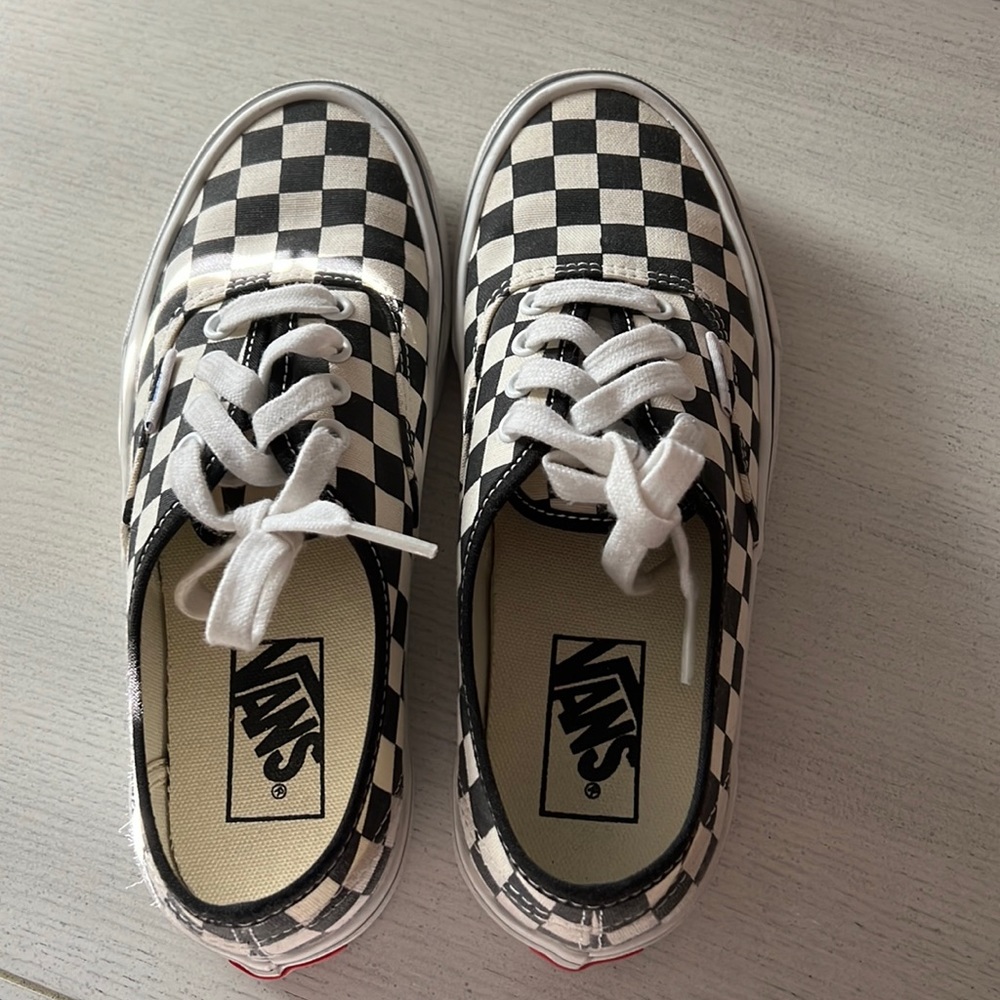 Woman’s checkered vans